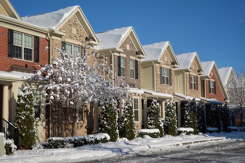 Row of homes in the snow