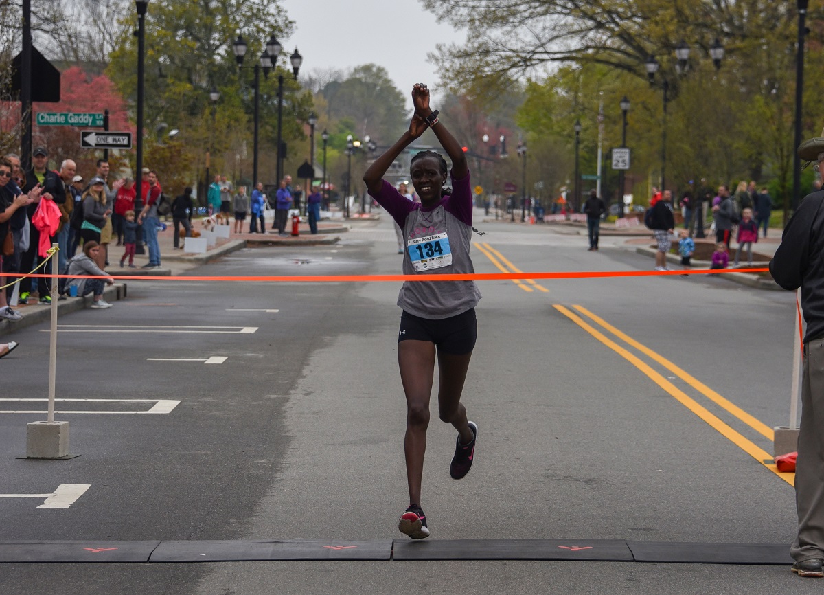 Runner crossing the finish line