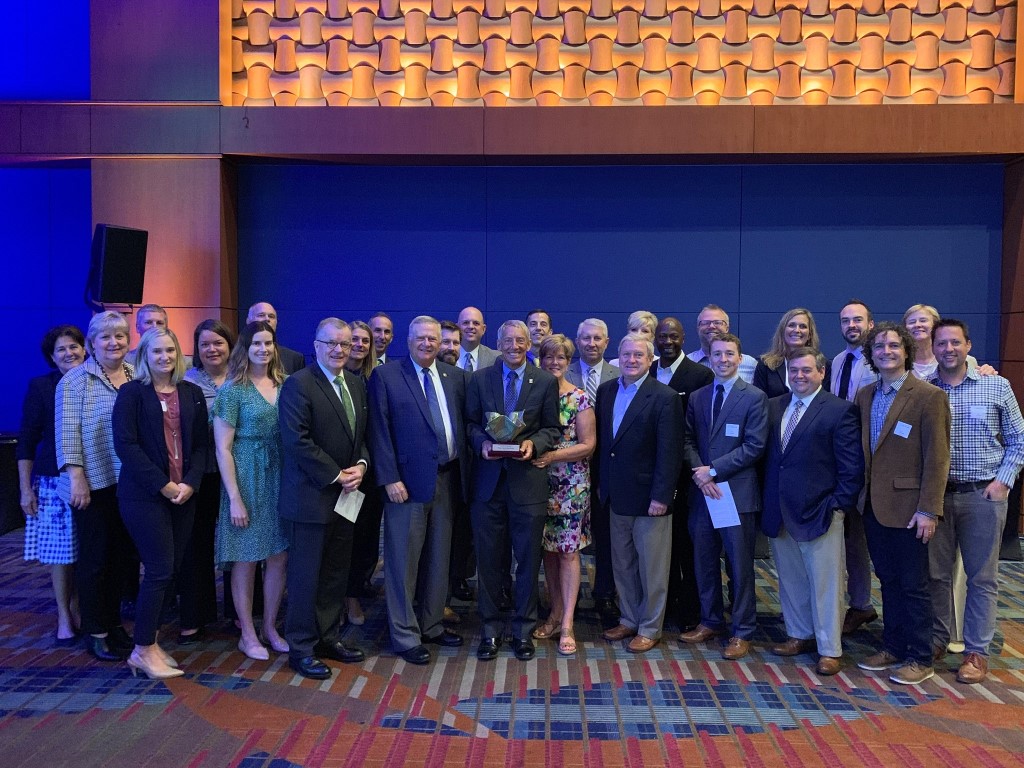 Mayor and staff receiving award