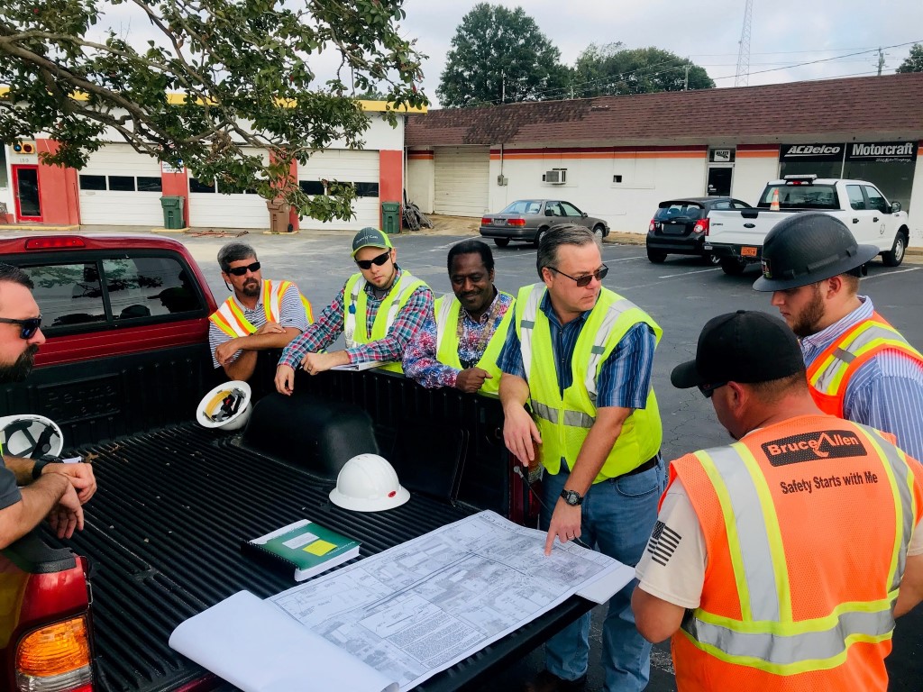 Workers talking at construction site