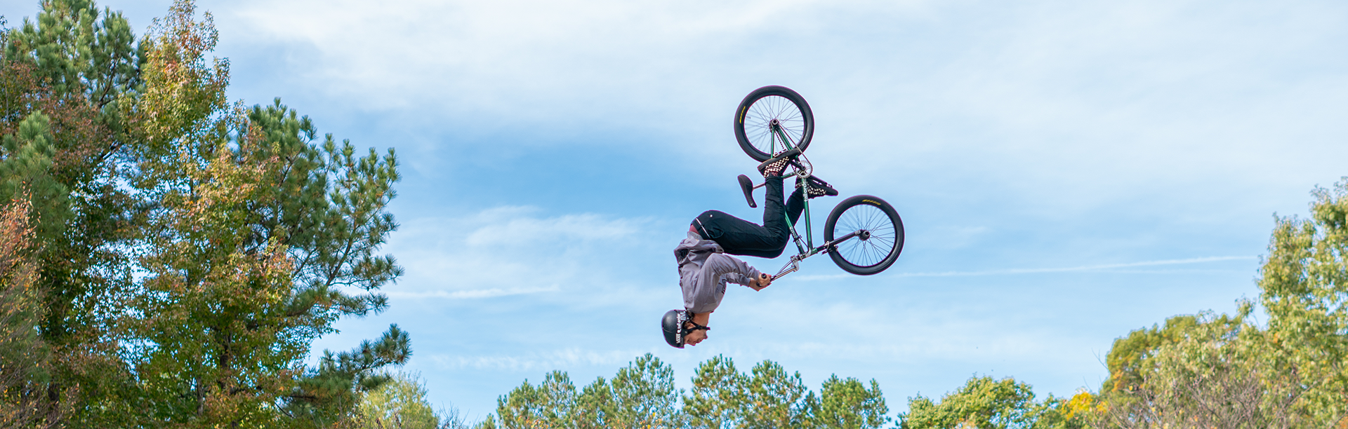 bmx cyclist riding on ramps