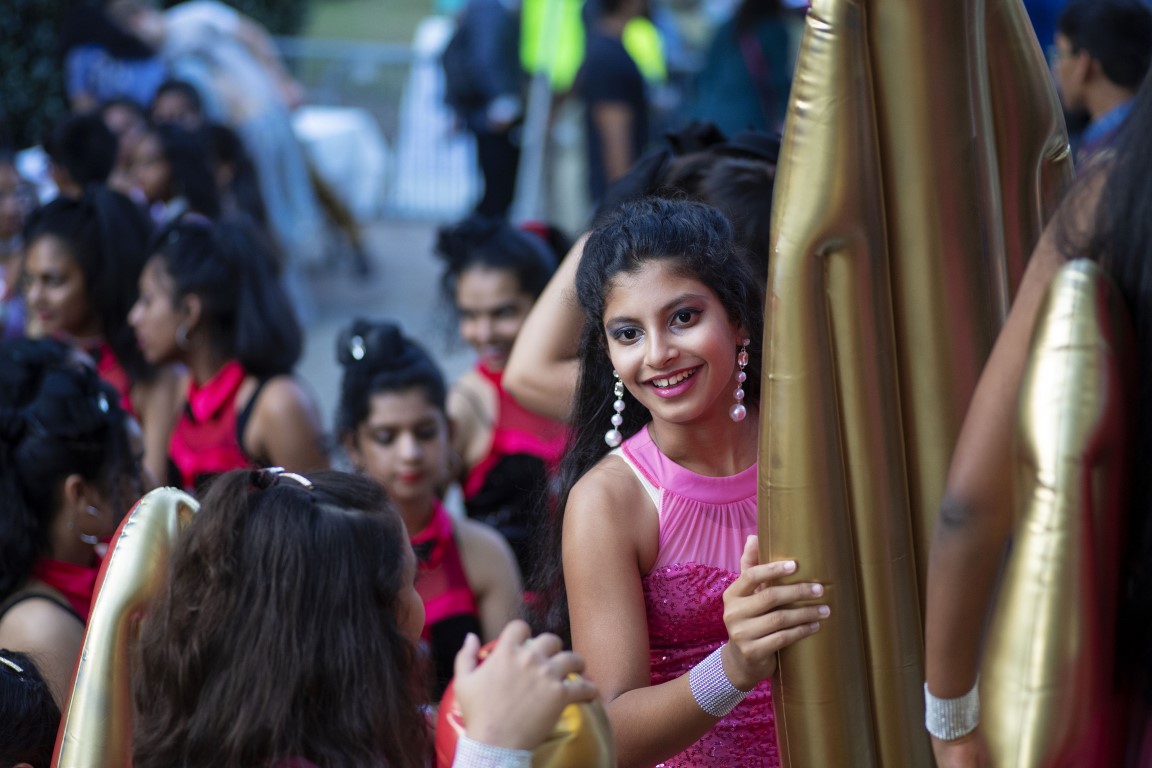 smiling performer backstage at Diwali 2019