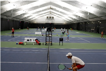 Players on Covered Courts at Cary Tennis Park