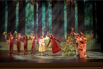 Actors on stage at Youth Theater performance