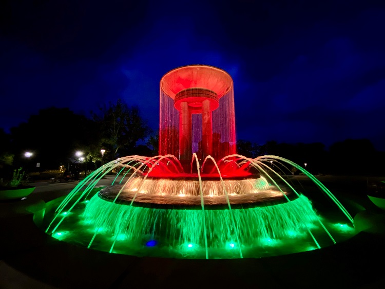 Fountain lit with Juneteenth colors