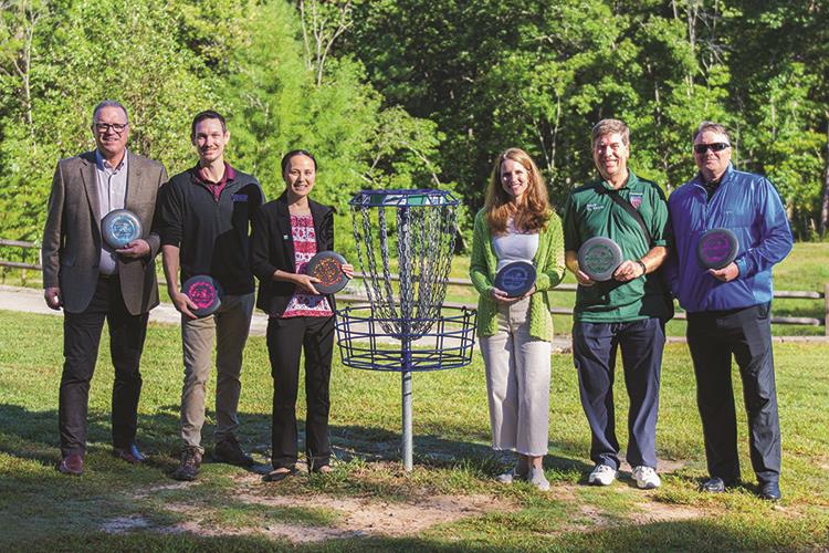 Ribbon cutting at disc golf course