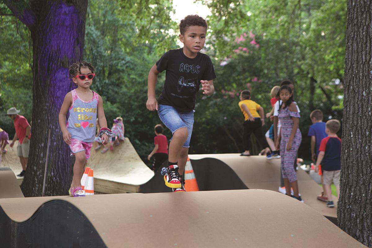 Child running at Celebrate Cary event