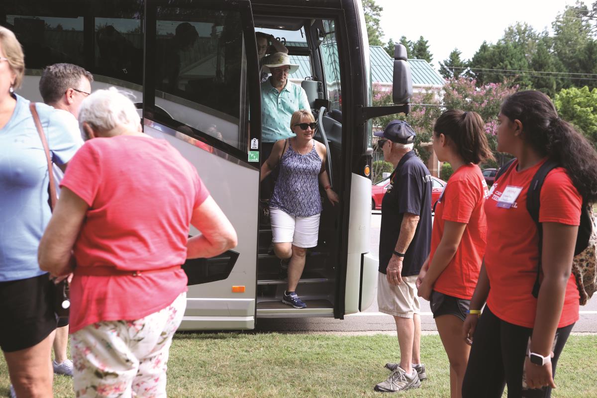 Woman exits bus