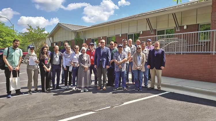 Group photo at treatment plant