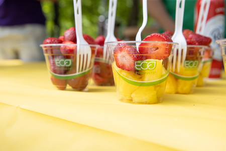 Fruit in a cup with a green Eco Products logo