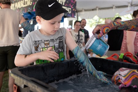 A child is getting their arm marbled