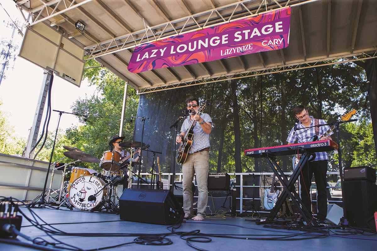 Musician on stage at Lazy Daze