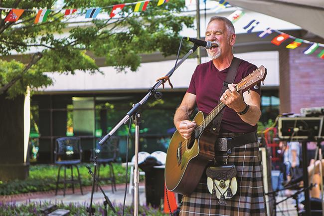 Musician performing at Lazy Daze