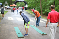 Kids Doing Mini Golf